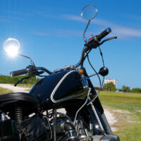 vintage motorcycle on dirt road